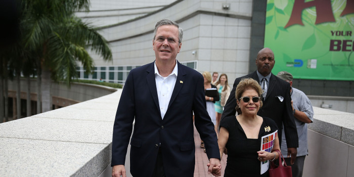 MIAMI, FL - JUNE 05: Former Florida Governor Jeb Bush and possible Republican presidential candidate walks with his wife, Columba Bush, as they arrive to present awards to the 2015 Arts for Life! scholarship winners at the Adrienne Arsht Center for the Performing Arts in Miami-Dade County on June 5, 2015 in Miami, Florida. Gov. Jeb Bush is expected to announce his plans to formally begin a run for the Republican presidential nomination on June 15th in Miami, Florida. (Photo by Joe Raedle/Getty Images)